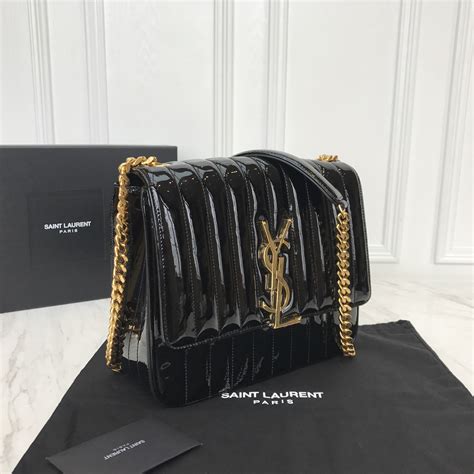 cream ysl purse|yves saint laurent purse.